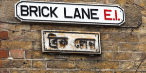 Brick Lane road sign translated