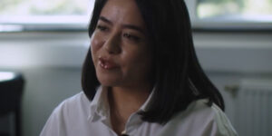 Female graduate talks about joint honours degrees sitting in a seminar room