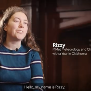 Rizzy, student from Wales sits in a lecture theatre